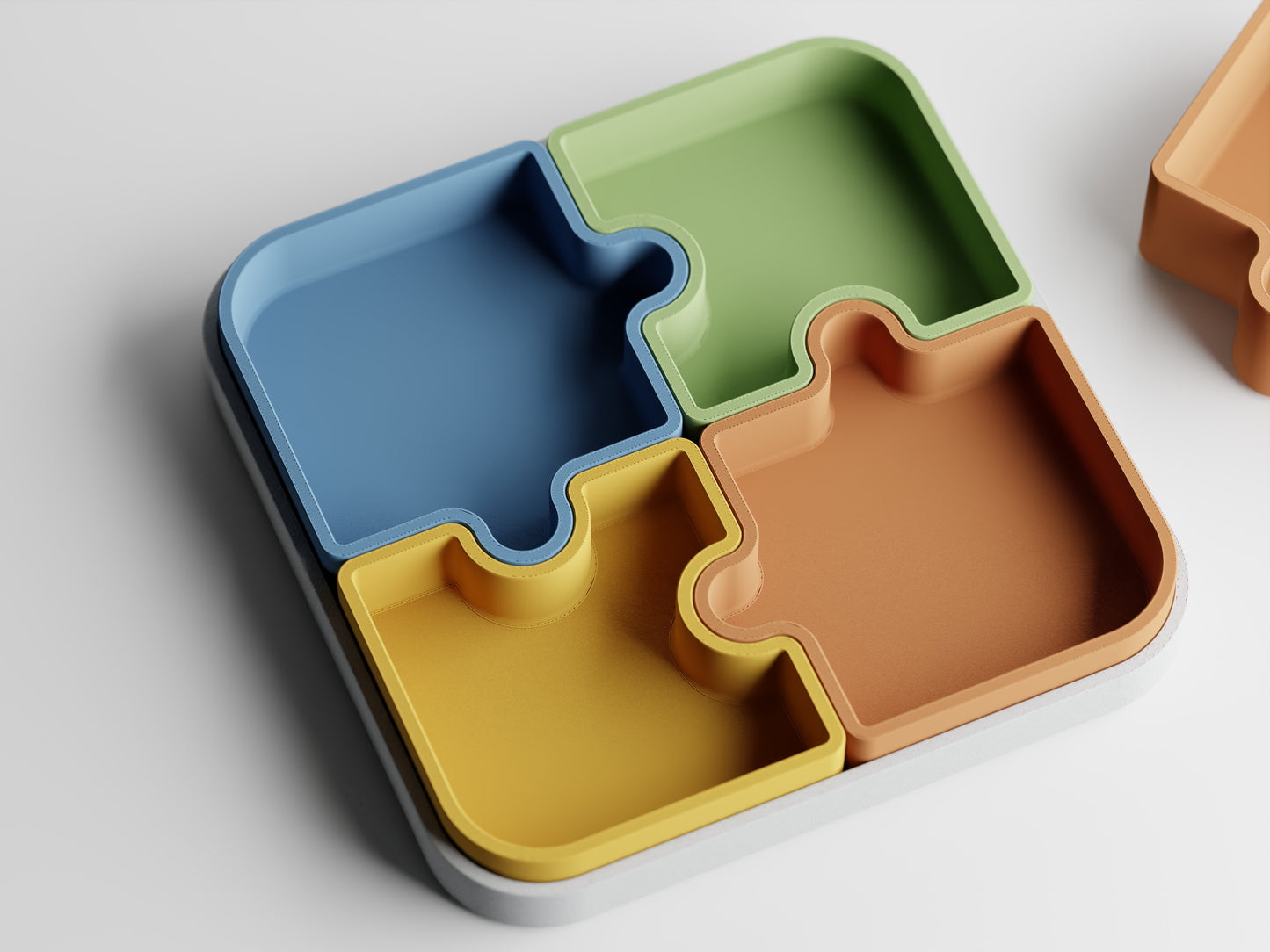 Piece of Mind modular tray set held at sunset