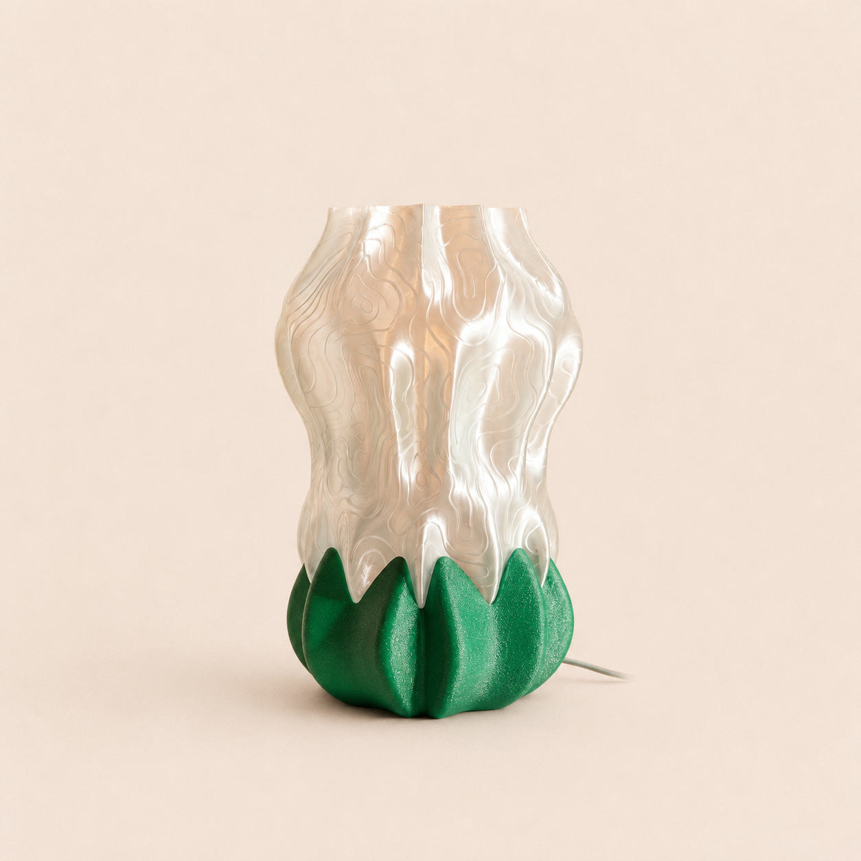 Luma Bloom Lamp — 3D printed flower-shaped table lamp with a glowing translucent shade