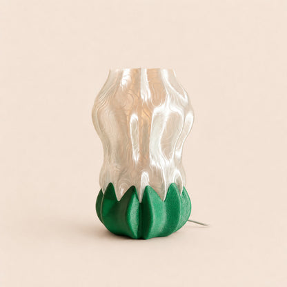 Luma Bloom Lamp — 3D printed flower-shaped table lamp with a glowing translucent shade