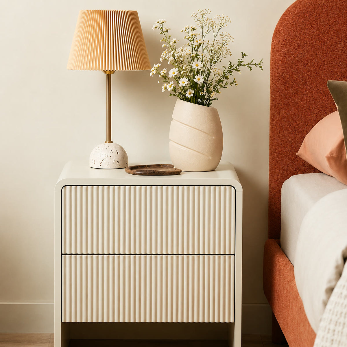 Ellipse Vase styled on a bedside table