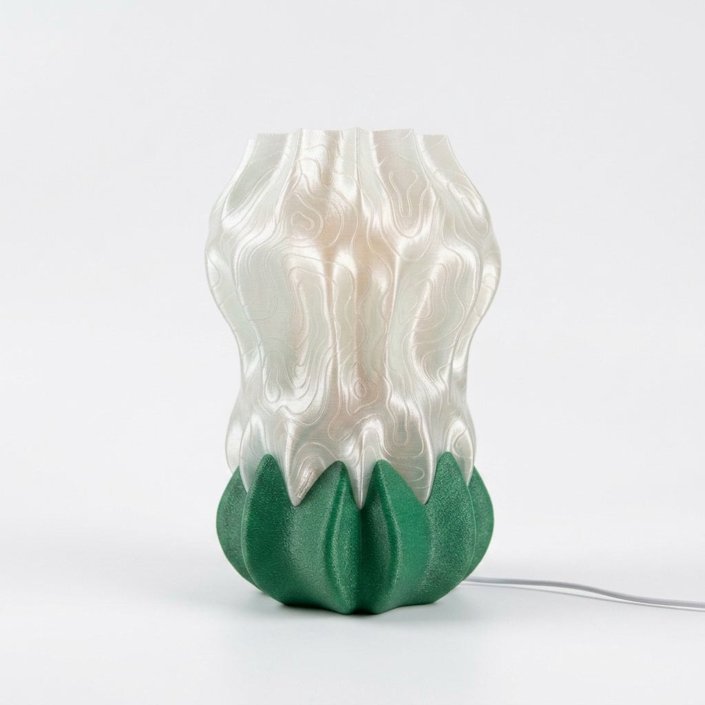 Luma Bloom Lamp — 3D printed flower-shaped table lamp with a glowing translucent shade
