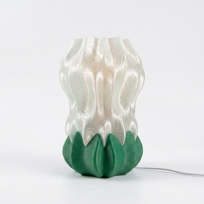 Luma Bloom Lamp — 3D printed flower-shaped table lamp with a glowing translucent shade