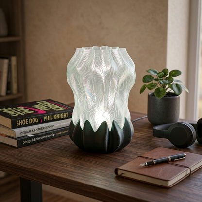 Luma Bloom Lamp — 3D printed flower-shaped table lamp with a glowing translucent shade