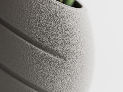 Ellipse 3D printed vase with a soft fabric-like surface