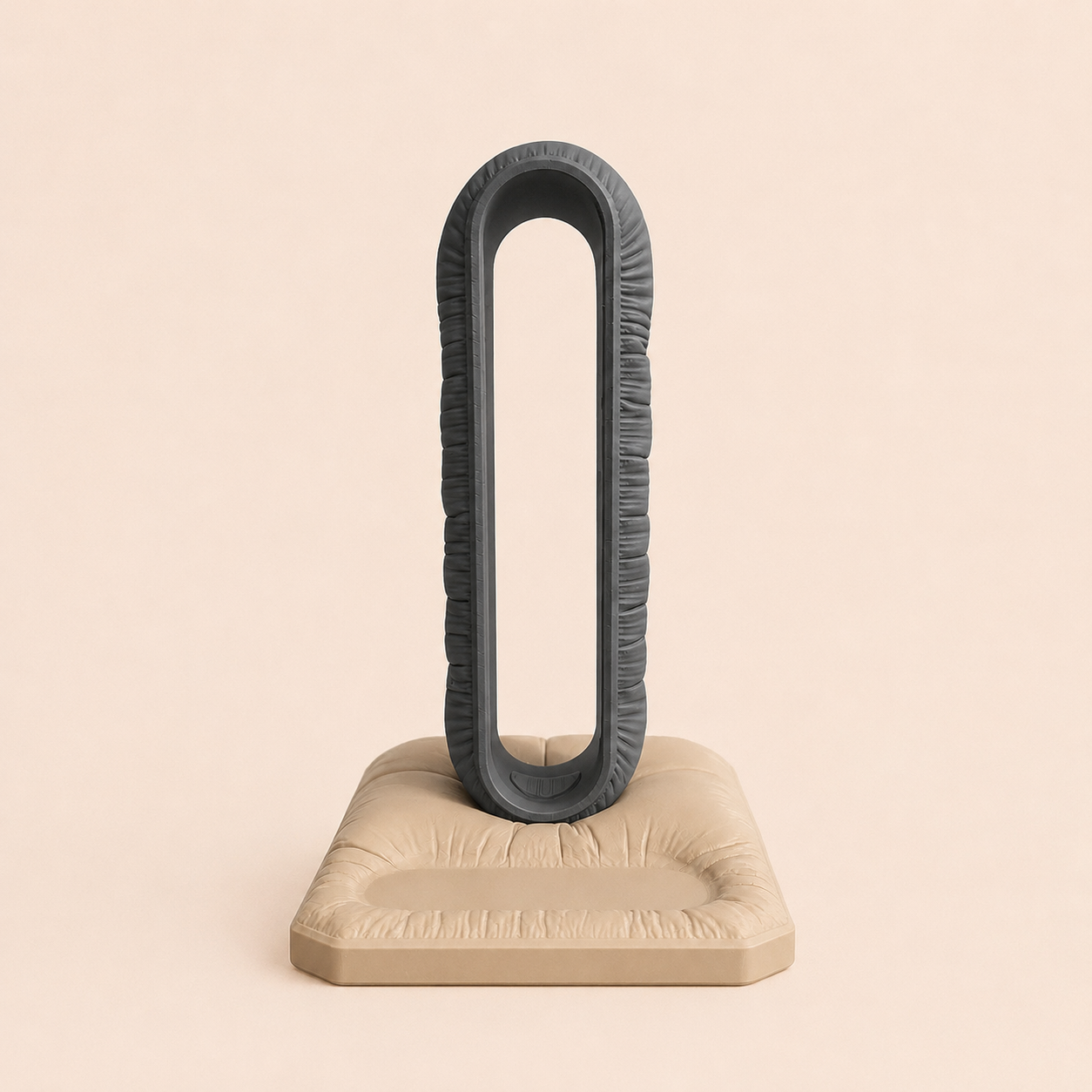 Cushion Headspace headphone stand — ruched grey arch on a pillow base