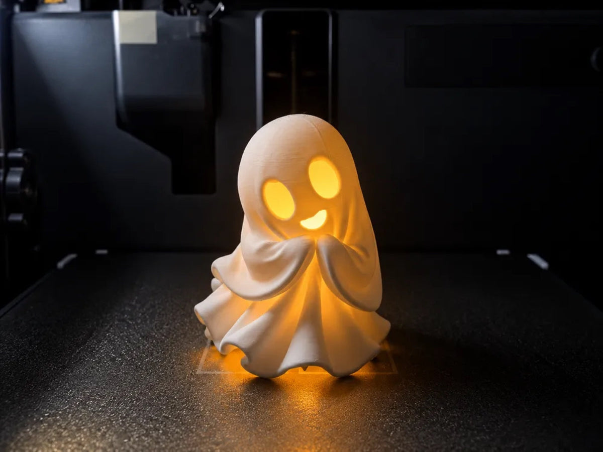 Ghost tealight detail - the carved eyes and smile illuminated