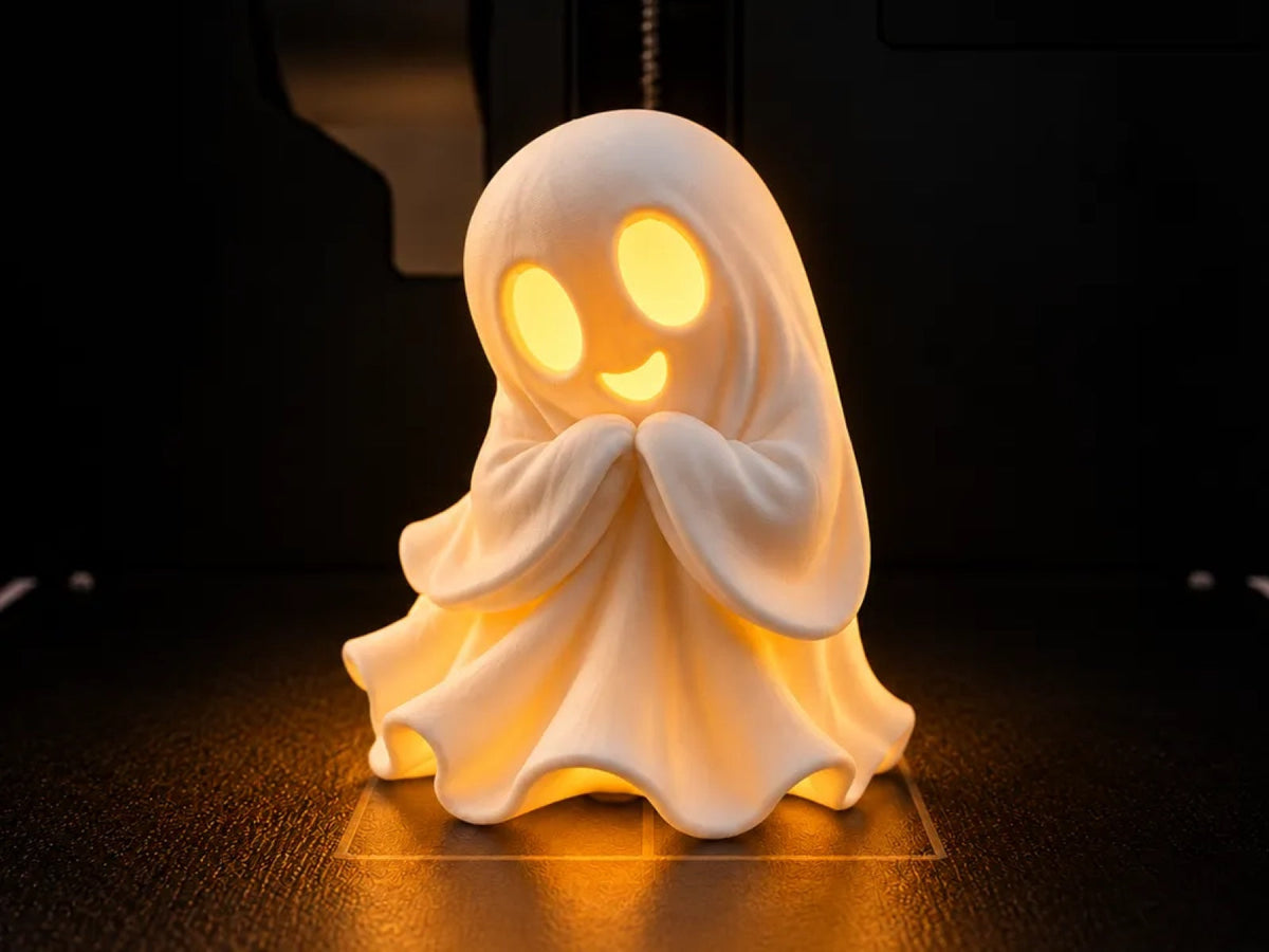 Shy Ghost - a bashful ghost tealight with hands clasped over its mouth (secondary)