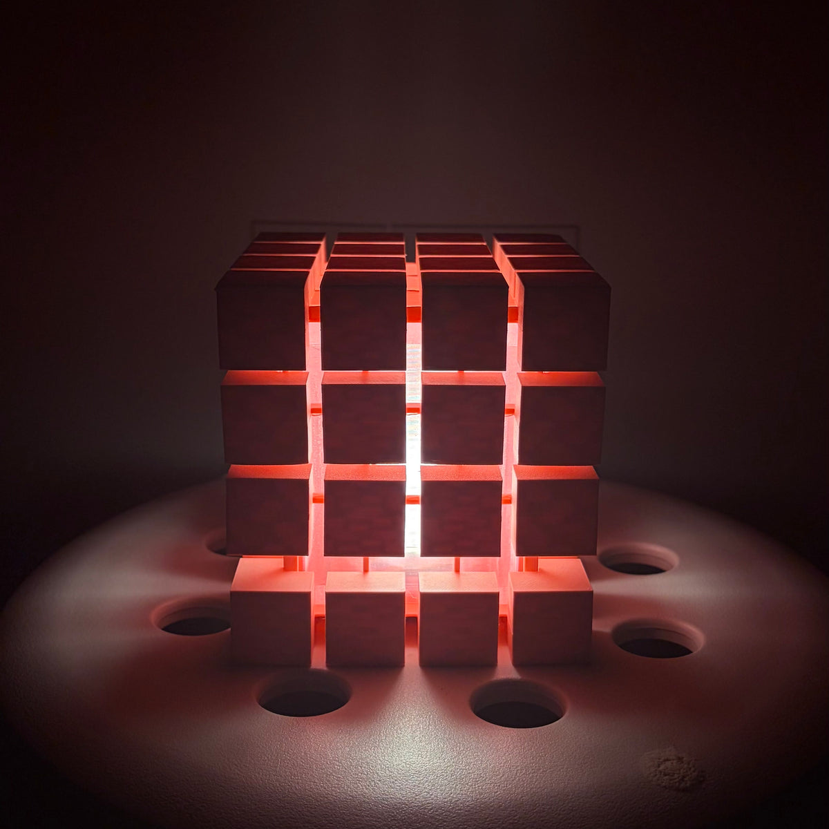 Rubrik Lamp lit in a soft warm room