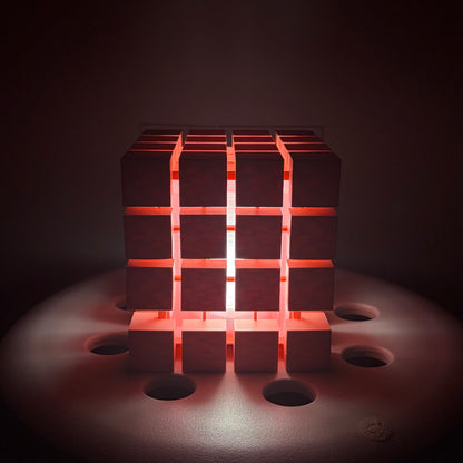 Rubrik Lamp lit in a soft warm room