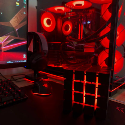 Rubrik Lamp on a gaming desk with red RGB glow