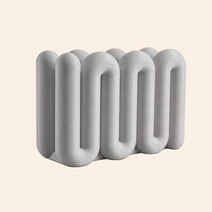 The Loop Stand Large in grey, three-wave front view on warm white
