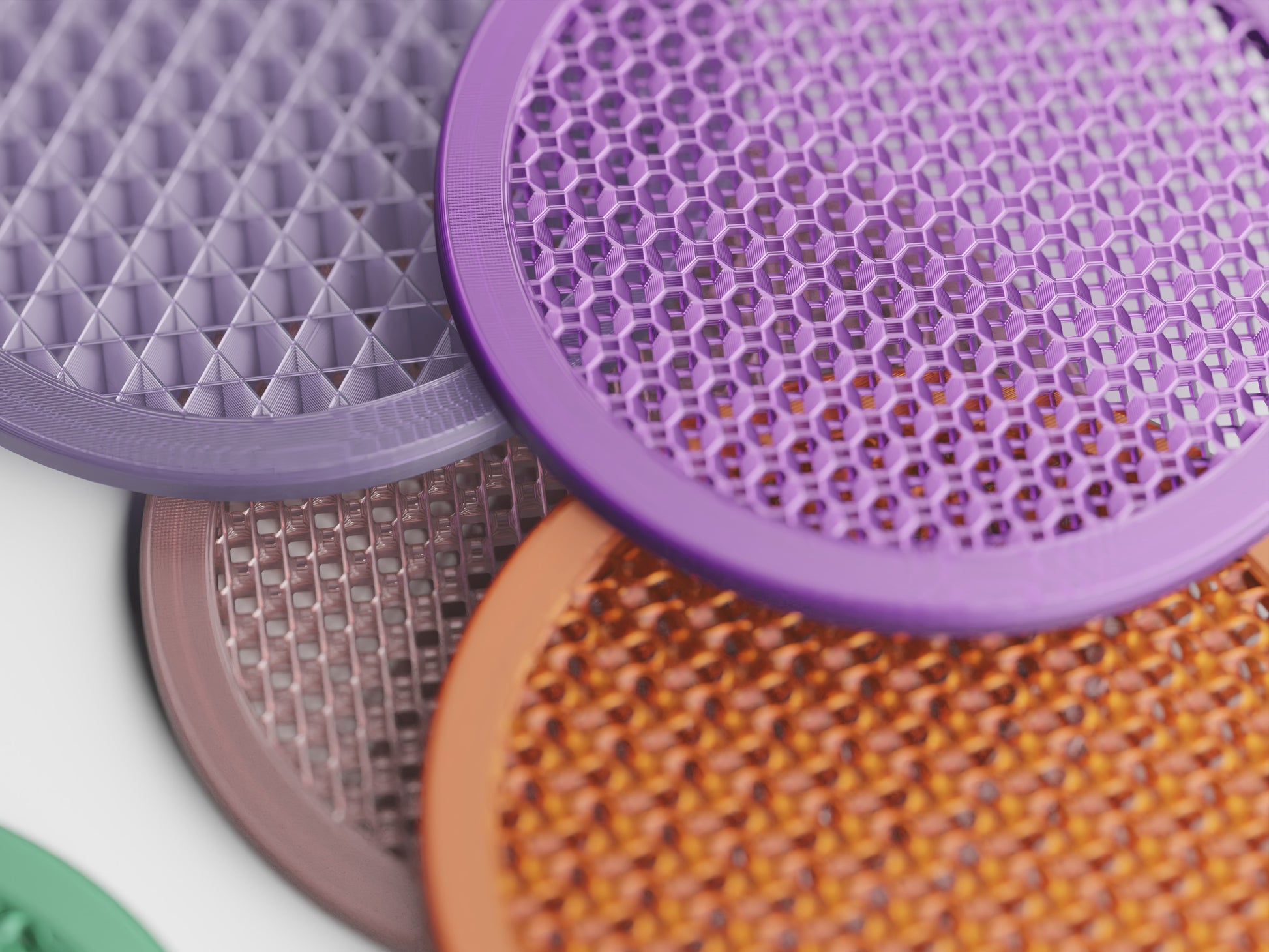 Orbit coaster with a textured non-slip top under a glass
