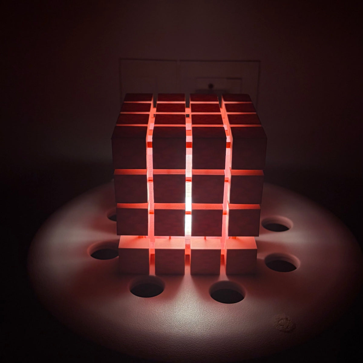 Rubrik Lamp — Pink lamp with warm glow