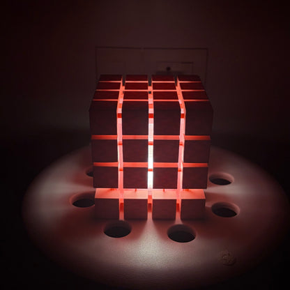 Rubrik Lamp — Pink lamp with warm glow