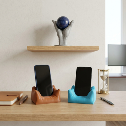 Sofa Lounger Phone Stand in ice blue and chocolate brown holding phones