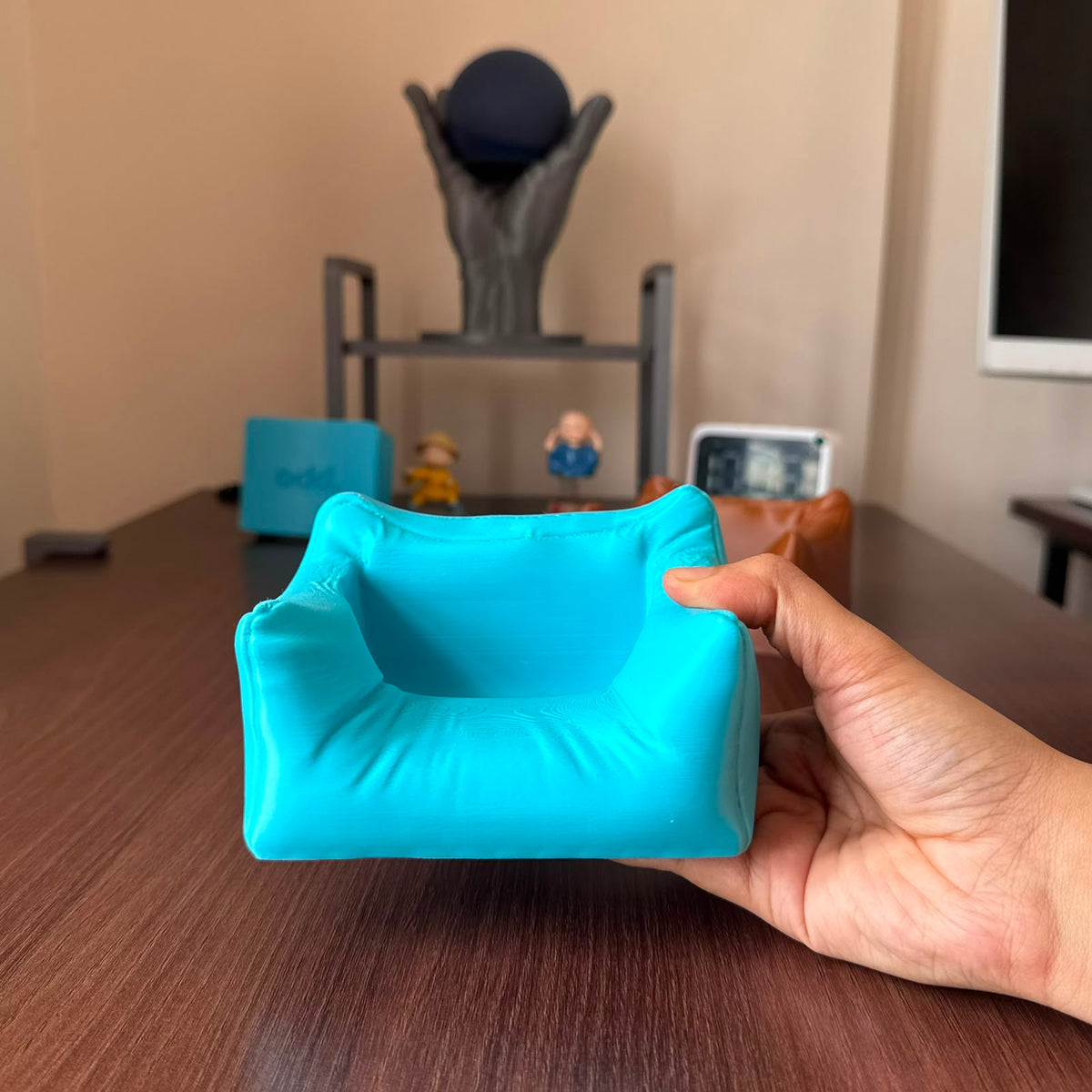 Sofa Lounger Phone Stand in ice blue, real product