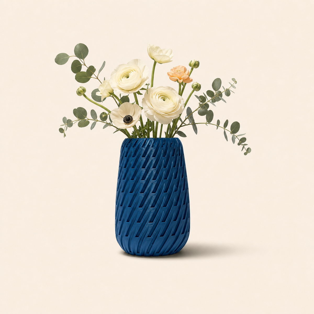 Blue Sway Vase styled with white and peach flowers