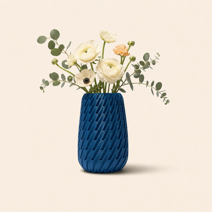 Blue Sway Vase styled with white and peach flowers