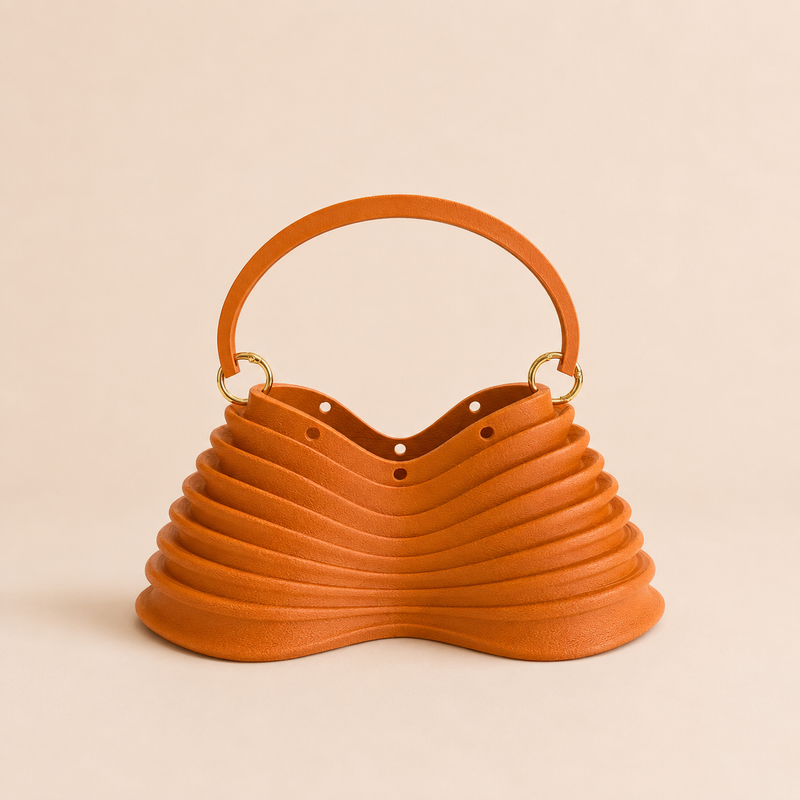 Thorax Bag — 3D printed rib-cage handbag in terracotta, studio front view