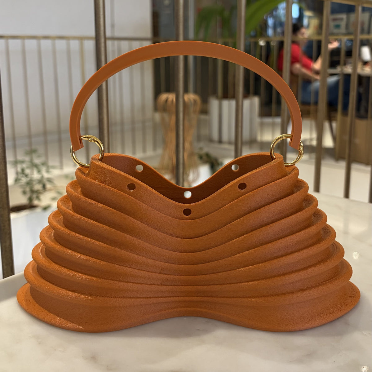 Thorax Bag front view showing the ribbed structure and ringed handle