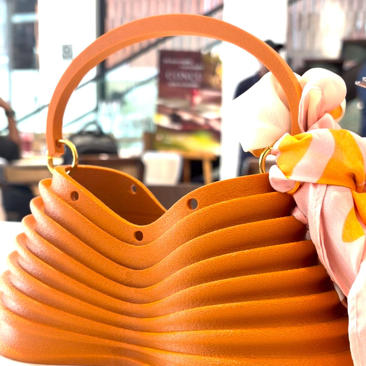 Thorax Bag carried out, styled with a silk scarf