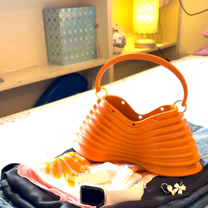 Thorax Bag in a flat-lay with jeans, watch and jewellery