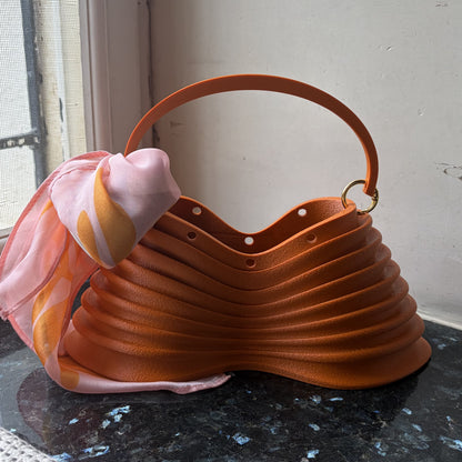 Thorax Bag side profile by a window, backlit