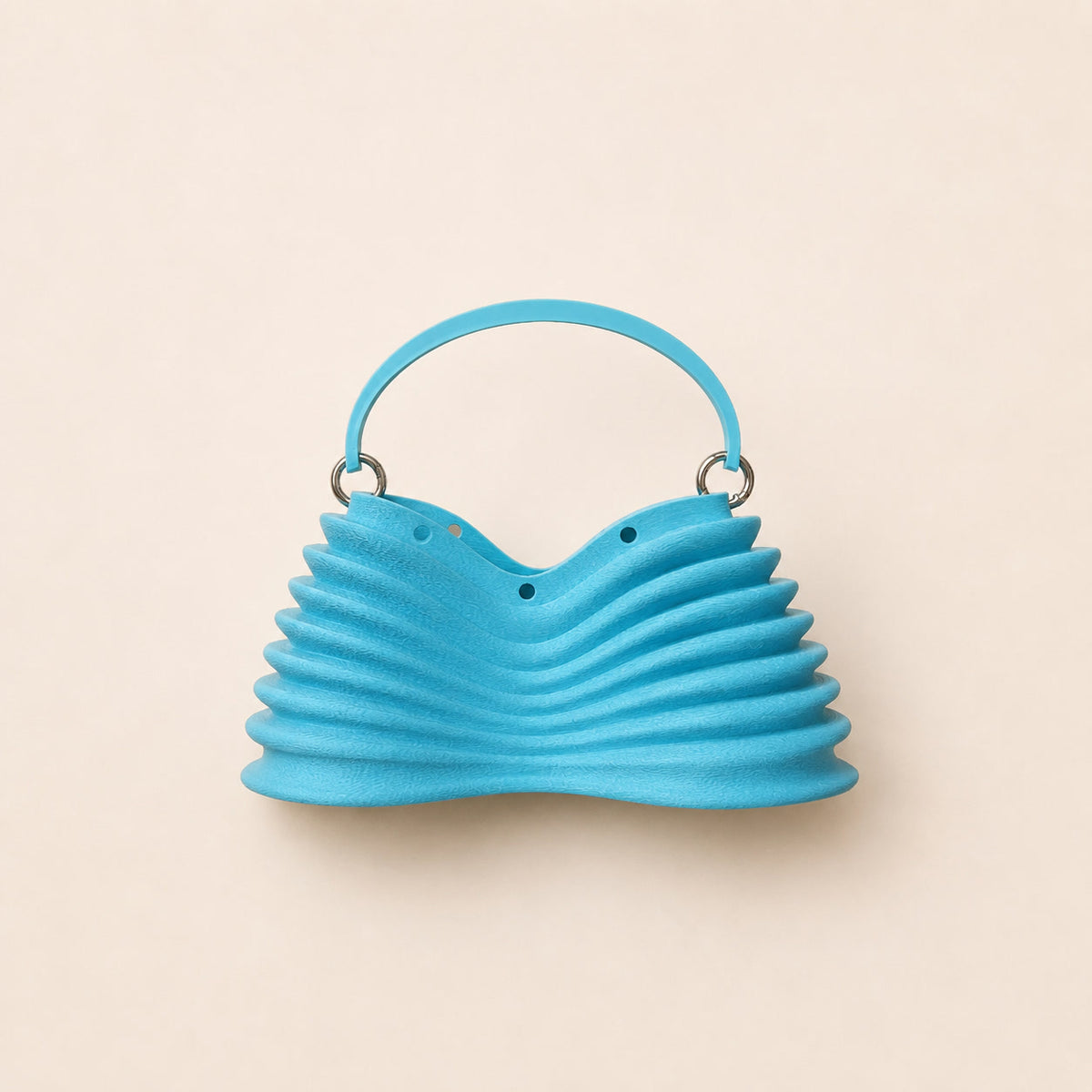 Thorax Bag in aqua blue — studio front view
