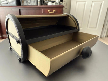 Tambour Vault Storage Box rolled open, showing the inner compartment and sliding tray